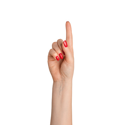 Female hand with red nail polish presses, on a white background, isolate