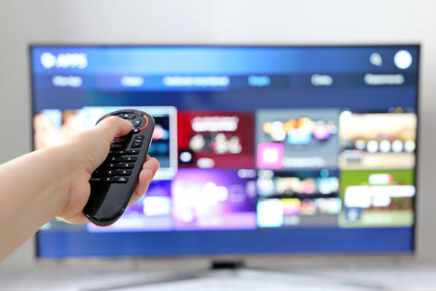 person choosing streaming services, watching movies  tv app features