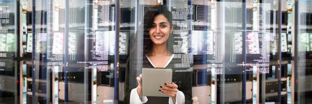 Female IT engineer in data center Female IT engineer in data center cloud computing photos stock pictures, royalty-free photos & images