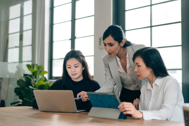 Female leadership in an all women business team stock photo