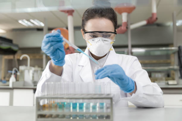 Female scientist working in the CDC laboratory. stock photo