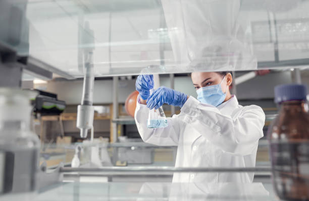 Female scientist working in the laboratory. stock photo