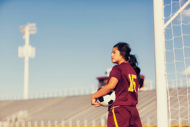 Female Soccer Player Portrait of a high school soccer player of Latin descent.  mexican teenage girls stock pictures, royalty-free photos & images