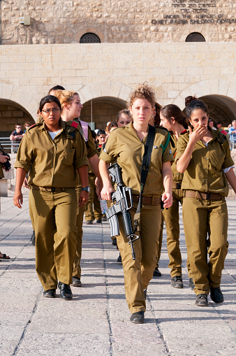 Jerusalem, Israel - October 20, 2010: Young women in the Israeli Defense Force walk in the Old City of Jerusalem