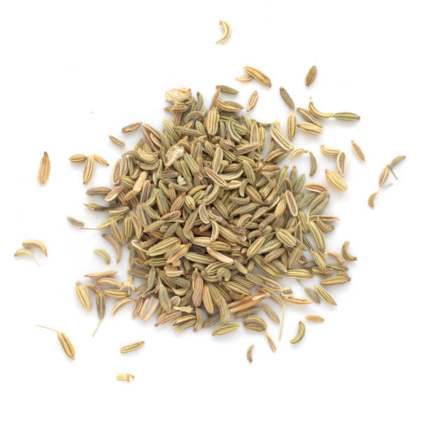 Fennel seeds on white background stock photo