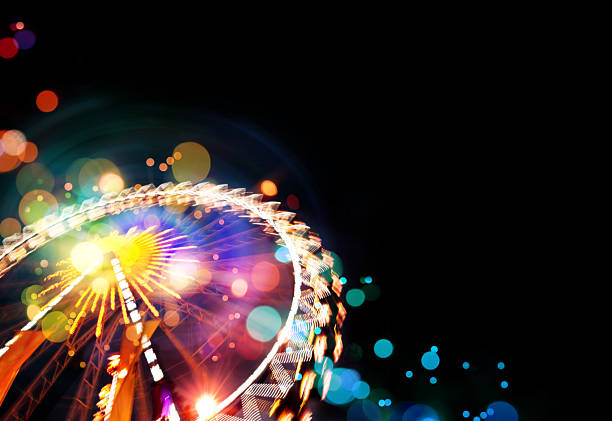 Ferris wheel background with bokeh effects stock photo