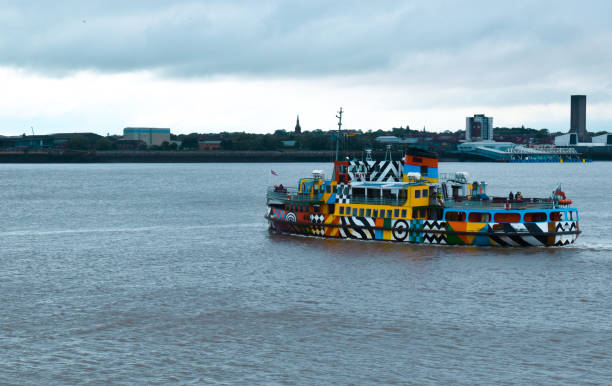Ferry across the River Mersey, Liverpool, England The bright and vibrant ferry across the river mersey similar to the Beatles song. merseyside stock pictures, royalty-free photos & images