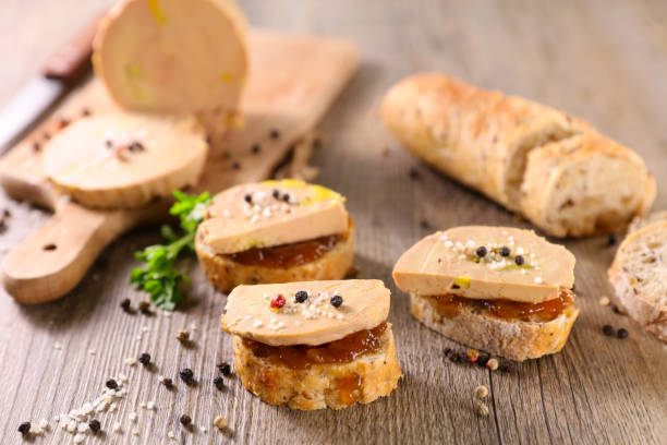 festive canape with foie gras and onion stock photo