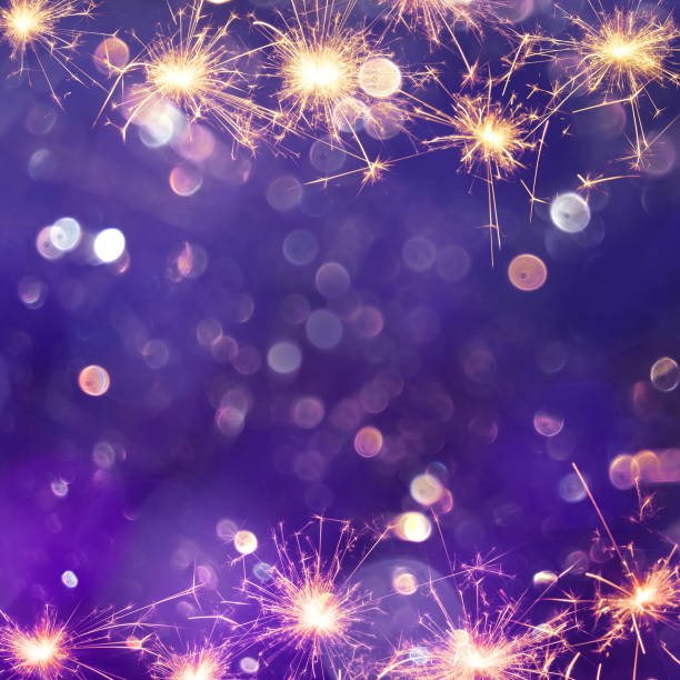 festive purple background with sparkles light - comemoração conceito imagens e fotografias de stock
