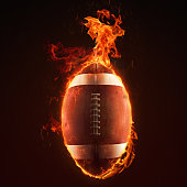 istock Fiery american football ball burning 1166364996