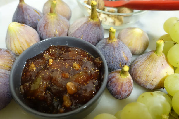 Fig, walnut and white grape jam  Homemade jam stock photo