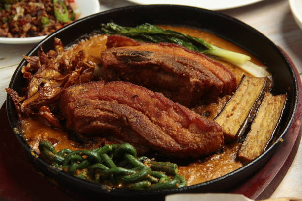 Filipino food called Kare Kare or meat and vegetables cooked in savory thick peanut sauce stock photo