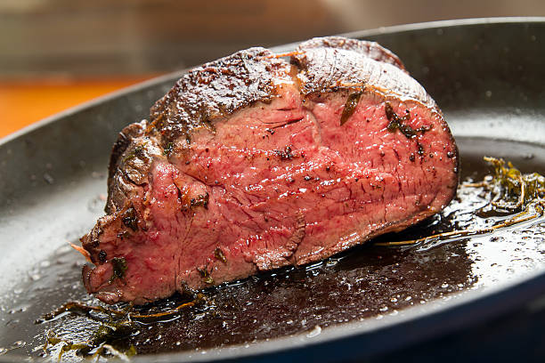 Fillet of beef in pan stock photo