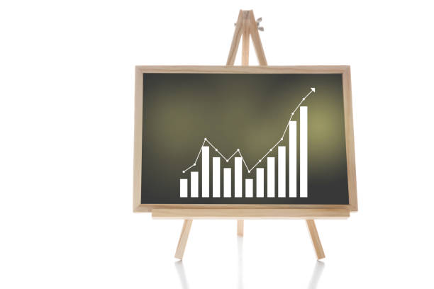 Financial growth graph stock trading on chalkboard isolated on white background stock photo