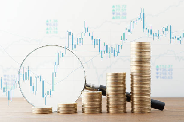 Financial market information and data analyzing. Money, magnifier and many charts. stock market chart stock pictures, royalty-free photos & images