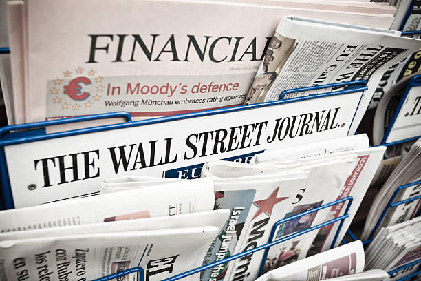 Financial Newspapers on a Newsstand stock photo