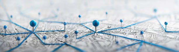 Find your way. Location marking with a pin on a map with routes. stock photo