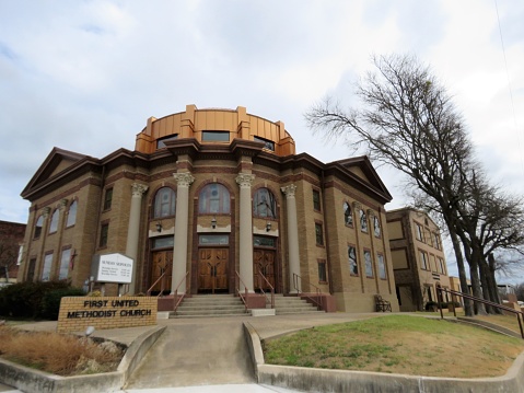 Stephenville, Texas, USA – March 1, 2021: Built in 1917, the United Methodist Church sanctuary in Stephenville, Texas, is designed in a Beaux Arts-style. The UMC congregation in that town was established in 1854.