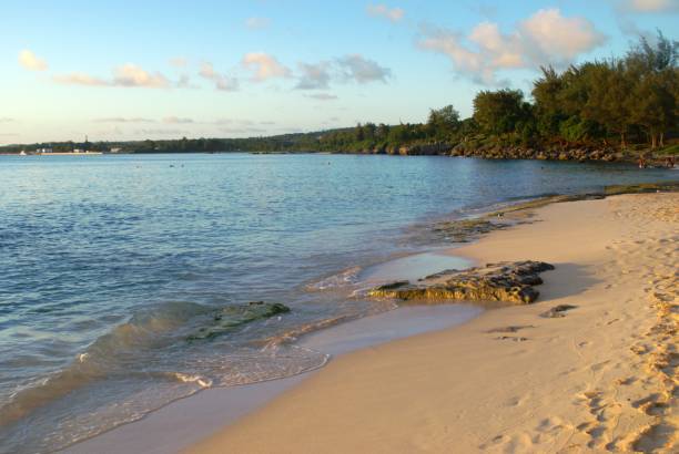 Fine whit sand at Tachogna Beach, Tinian, Northern Mariana Islands stock photo