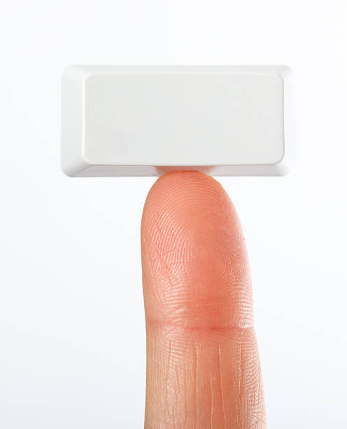Fingertip and empty rectangular key stock photo