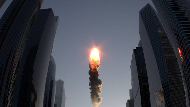 Fire ball flies between skyscrapers stock photo