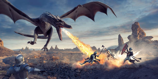 Fire Breathing Dragon Flying Low and Attacking Knights In Desert Fantasy image of a large dragon, flying low to the ground with tuned head and mouth open, breathing fire into a group of three medieval knights in armour. The knights are carrying weapons and a shield, and are being blown backwards by the blast. Another knight looks from the foreground. dragon photos stock pictures, royalty-free photos & images