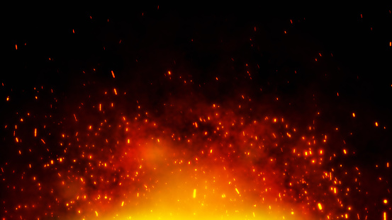 Fire sparks background. Abstract dark glitter fire particles lights. bonfire in motion blur.