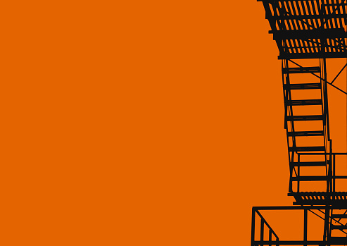 Fire Escape Silhouetted Against Orange Sky