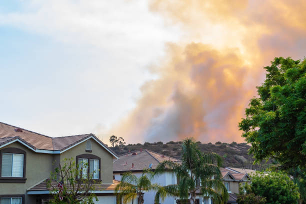 Fire threatens homes stock photo