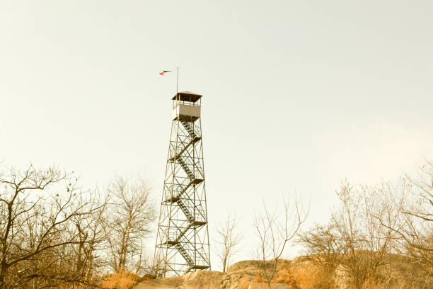 Fire tower at Mount Beacon This fire tower in mount Beacon was restored and opened to the public in 2013 fire lookout tower stock pictures, royalty-free photos & images