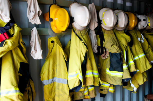 Firefighter Jackets and Helmets stock photo