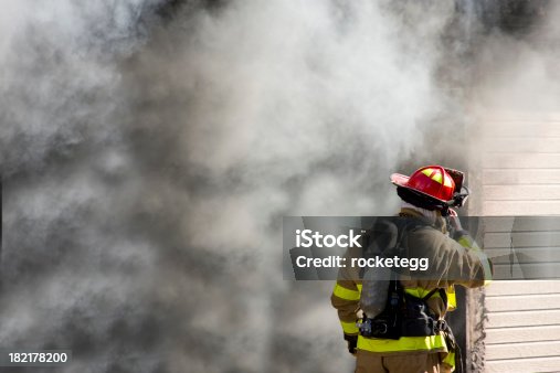 istock Firefighter Talking on Radio 182178200