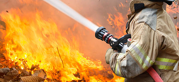 firefighters battle a wildfire stock photo
