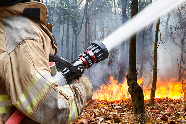 firefighters helped battle a wildfire stock photo