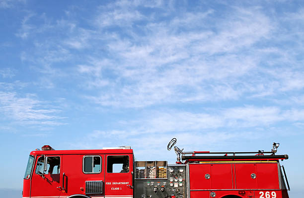 Firetruck against a blue sky stock photo