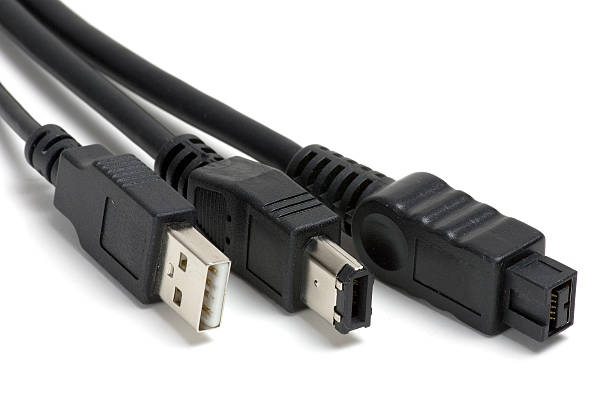 USB, FireWire 6 and 9-pin plugs stock photo