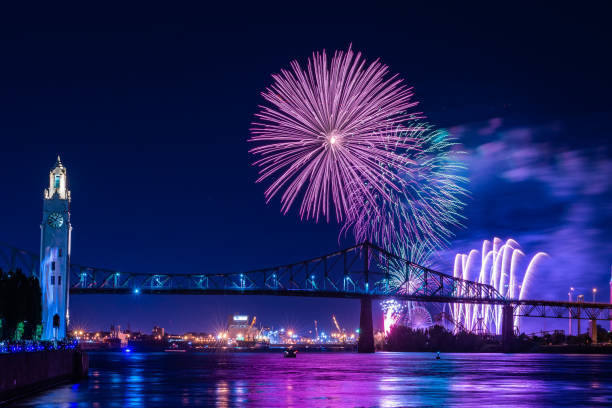 Fireworks display over a bridge stock photo