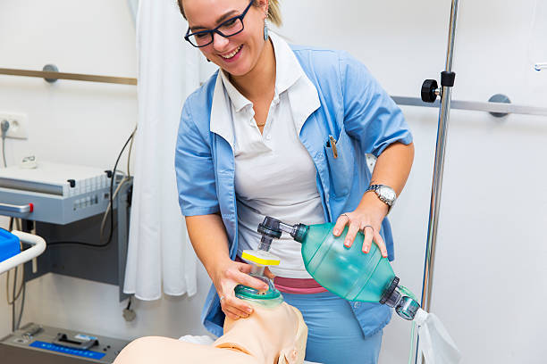 First aid CPR seminar,mechanical ventilation of dummy stock photo
