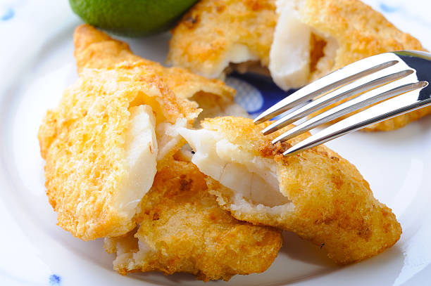 Fish and Chip Baked Cod fish fry stock pictures, royalty-free photos & images