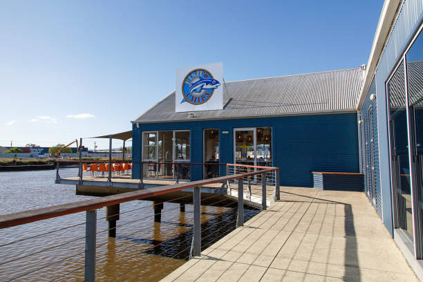 Fish and Chip Shop on Alexandra Walk - Launceston Launceston, Tasmania, Australia: March 30, 2018: Fish and chip shop overlooking the bay and marina at Alexandra Walk. Restaurants and coffee shops are located on the esplande. launceston australia stock pictures, royalty-free photos & images