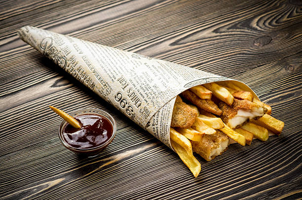Fish & Chips on wooden table stock photo