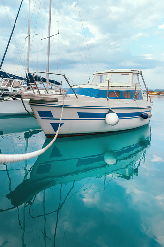 Fishing boat in seaside marina. Image is taken in town of Crikvenica in Croatia.