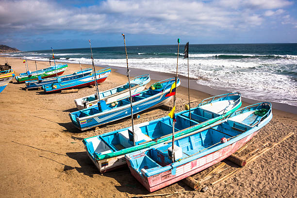 Fishing boats on the beach stock photo