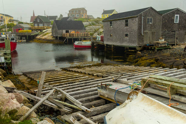 Fishing Village and Boats in Peggy's Cove Nova Scotia Fishing Village and Boats in Peggy's Cove Nova Scotia fishing village stock pictures, royalty-free photos & images