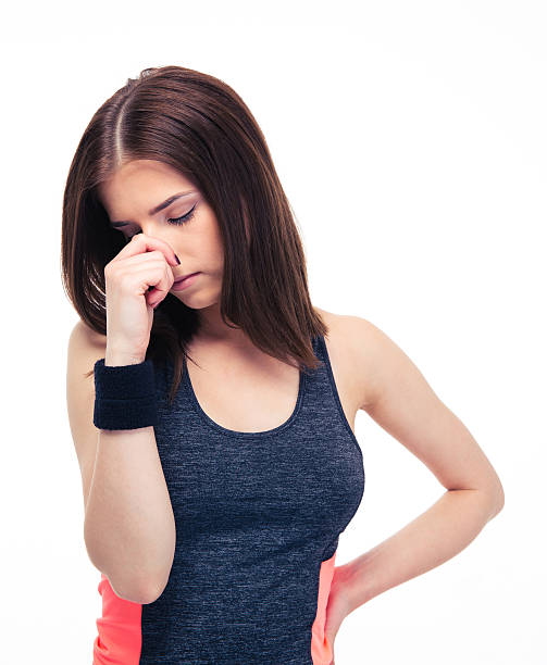 Fitness woman covering her nose with hand Fitness woman covering her nose with hand isolated on a white background ugly skinny women stock pictures, royalty-free photos & images