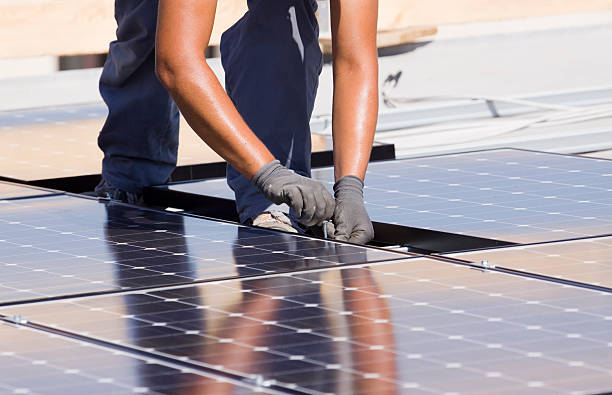 fitting photovoltaic panels stock photo