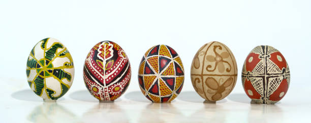 Five painted eggs stand in a line. Five painted eggs stand in a line. Traditional Easter ornament. easter sunday stock pictures, royalty-free photos & images