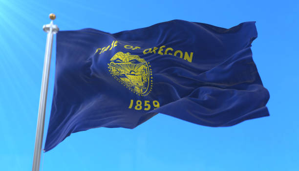 Flag of Oregon state, region of the United States Flag of american state of Oregon, region of the United States, waving at wind oregon us state stock pictures, royalty-free photos & images