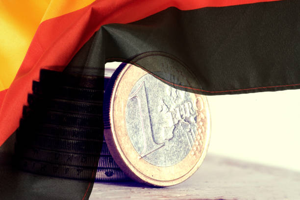 Flagge von Deutschland und Euro Münzen stock photo