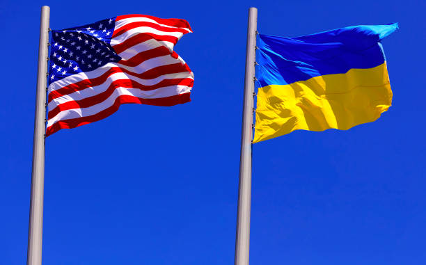 flags of the USA and Ukraine stock photo